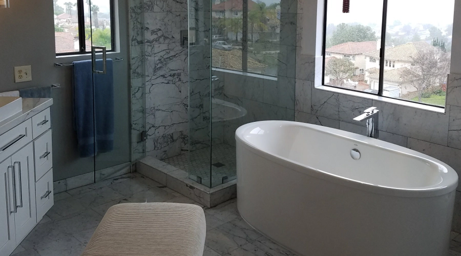 bathroom with shower and tub